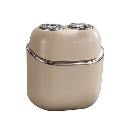 Mini afeitadora eléctrica portátil de doble cabezal totalmente lavable con diseño flotante magnético para hombres